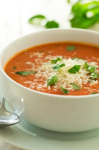 Creamy Tomato Basil Soup with Roasted Garlic and Asiago Cheese