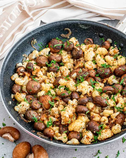 Salteado de Champiñones y Coliflor