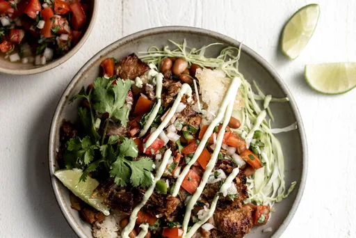 Carnitas Burrito Bowl with Avocado Crema