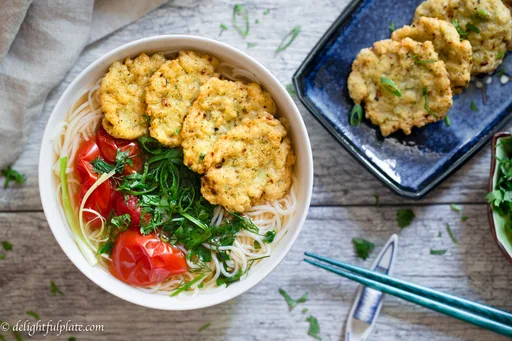Fried fish cake noodle soup in tomato dashi broth