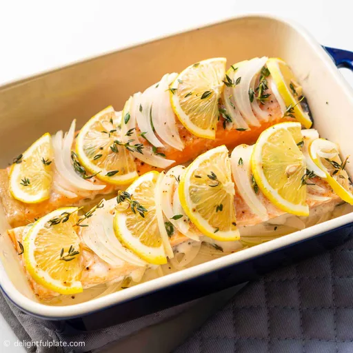Salmón al horno lento con limón y cebolla