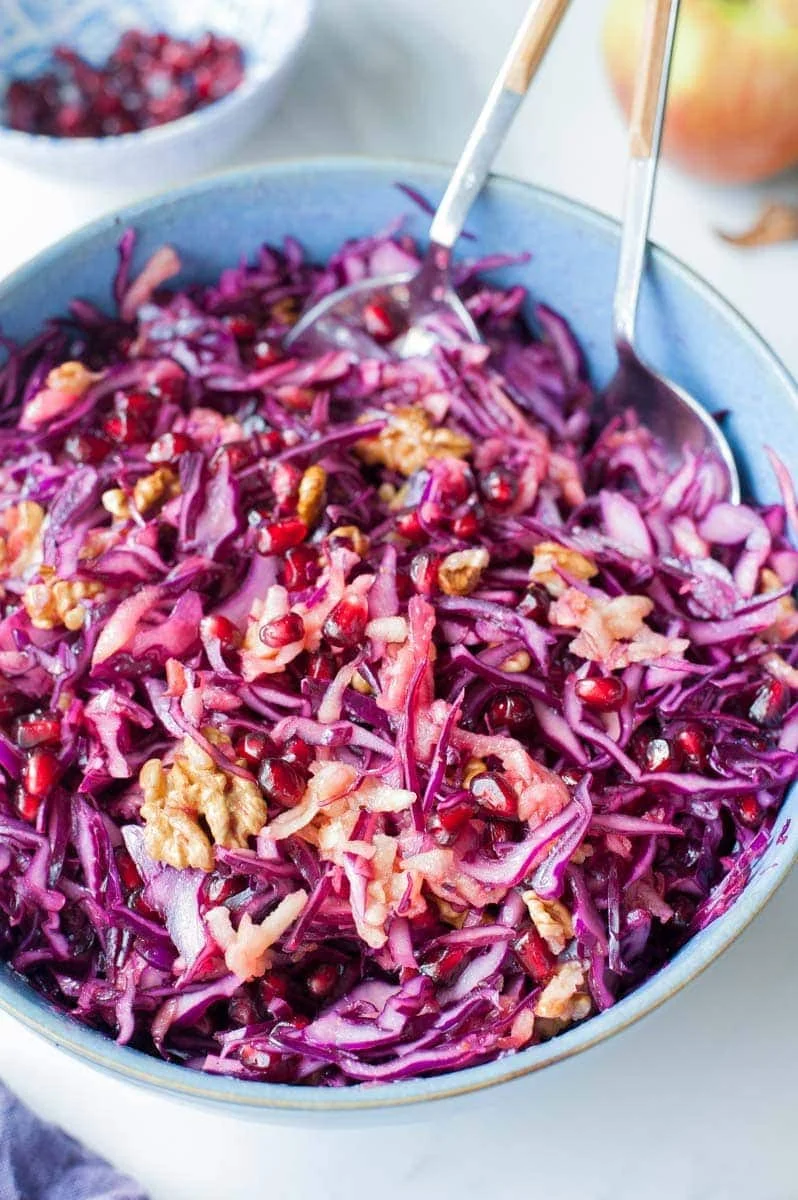 Red cabbage, apple, pomegranate and walnut salad