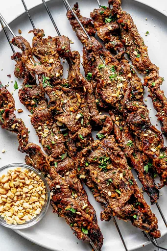 Brochetas de ternera al coco a la parrilla