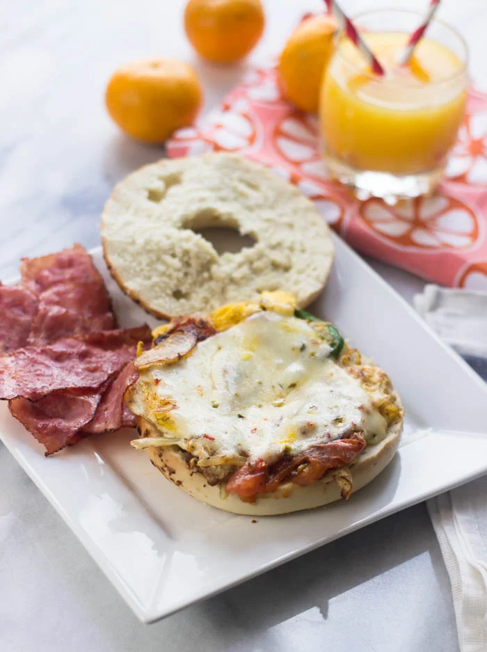 Easy Pastrami, Egg & Cheese on A Bagel with Sautéed Onions & Jalapeño