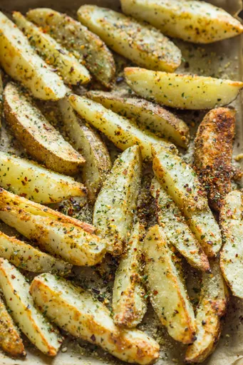 Gajos de patata crujientes al horno con ajo y parmesano