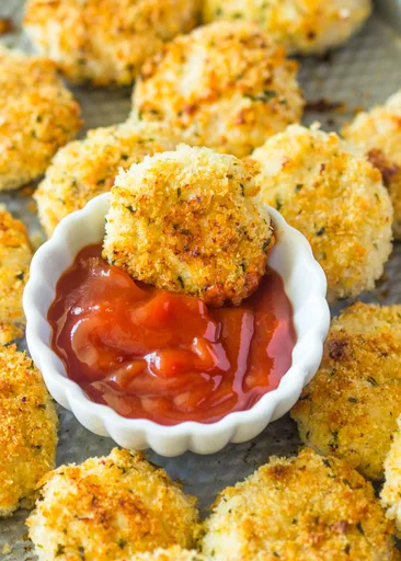 Nuggets de pollo crujientes al horno con parmesano