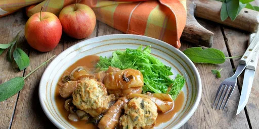 Sausage and apple casserole with herb-crusted dumplings