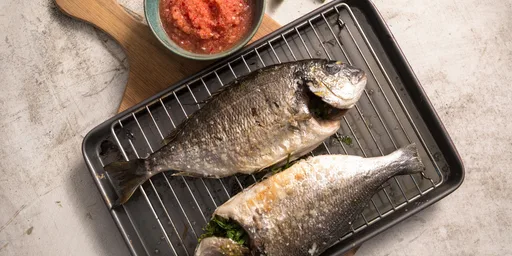 BBQ grilled fish with homemade chilli and lime dip
