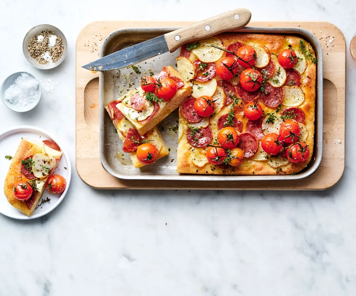 Blistered tomato, potato and truffle salami breakfast bread