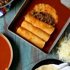 Beef Enchiladas with Green Olives and Raisins