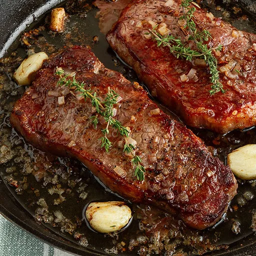 Bistec bañado en mantequilla