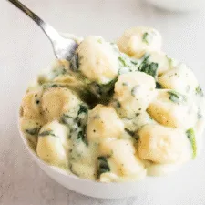 Ñoquis de espinacas al parmesano