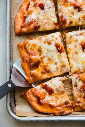 Base de pizza con queso requesón