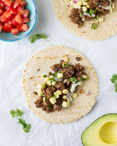 Black Bean Pecan Tacos with Lime Pepita Cream