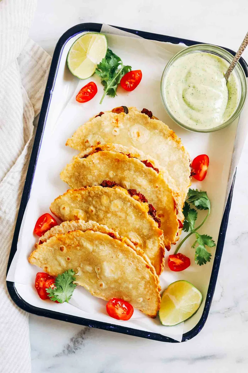 Baked Lentil Zucchini Tacos with Avocado Crema