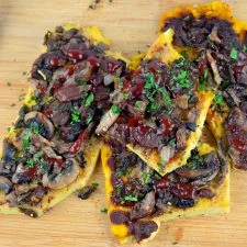 Cashew Polenta with Mushrooms and Tomato Pomegranate Reduction