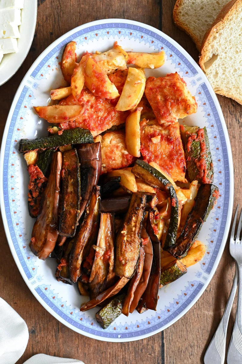Cod with eggplants, zucchini and potatoes