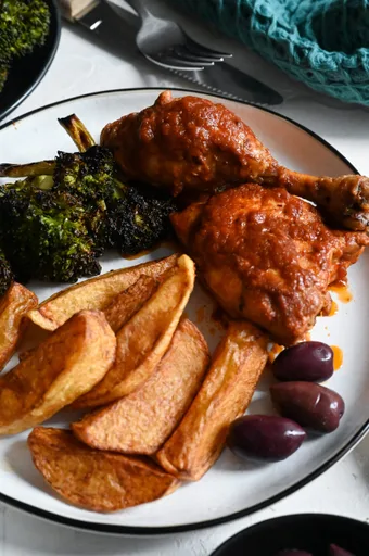 Chicken kokkinisto with french fries
