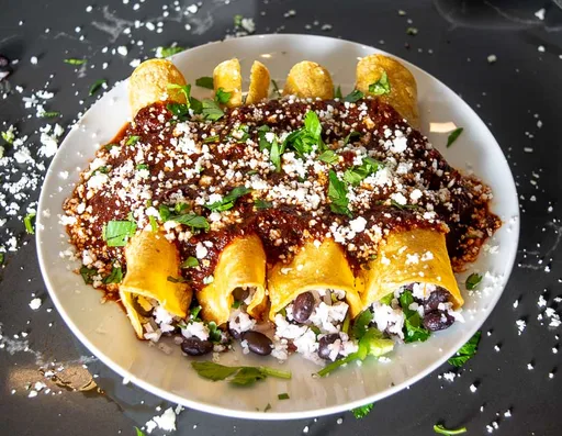Enchiladas de frijoles negros y arroz