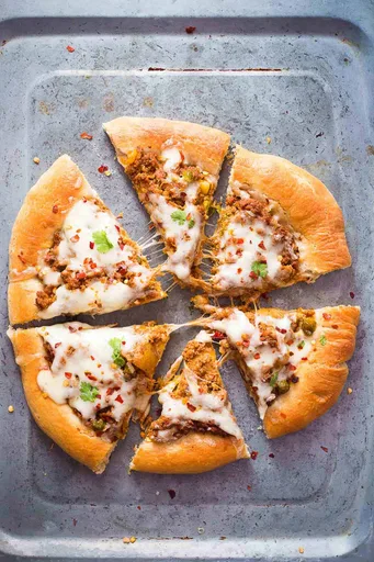 Pizza integral de cordero picado especiado (Keema)