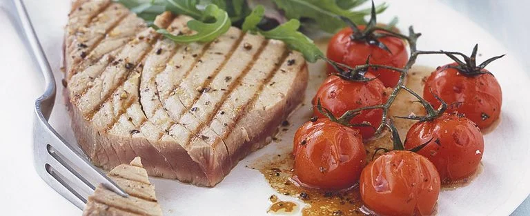 Tuna steaks with balsamic-roasted tomatoes