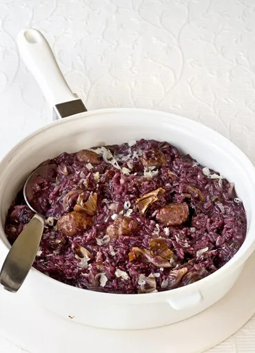Risotto de salchicha, achicoria y barolo
