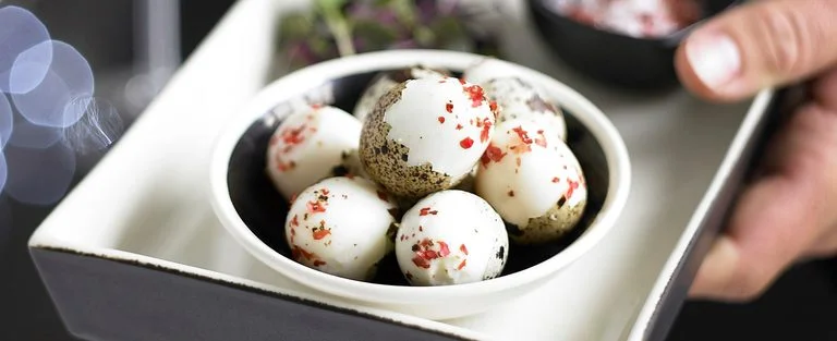 Quails’ eggs with pink peppercorn salt
