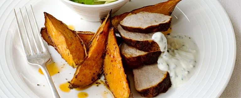 Paprika pork with sweet potato wedges