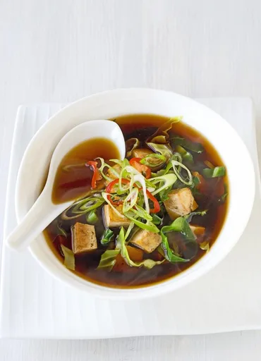 Miso flavoured broth with marinated tofu
