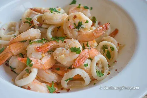 Gambas y calamares al ajillo y mantequilla