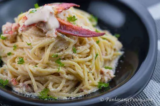 Receta de pasta con bogavante en cremosa salsa Alfredo