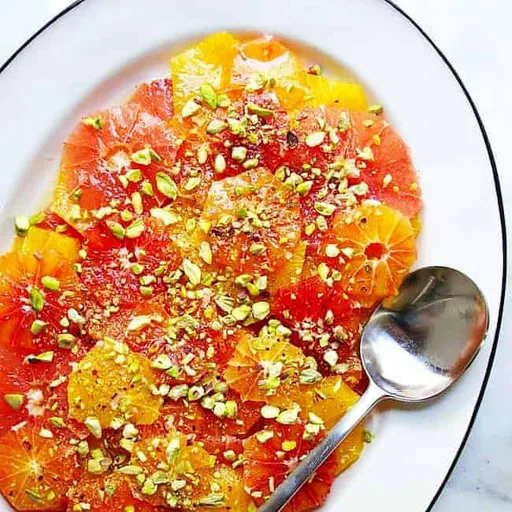 Mixed Citrus Salad with Honey Lemon Mint Vinaigrette and Pistachios