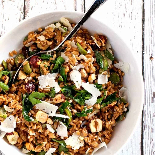 Farro Salad with Green Olives, Hazelnuts and Raisins