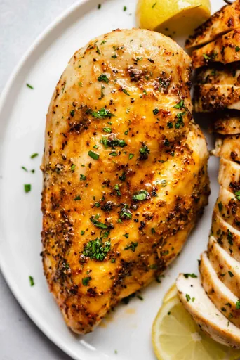 Pechugas de pollo con hueso al horno