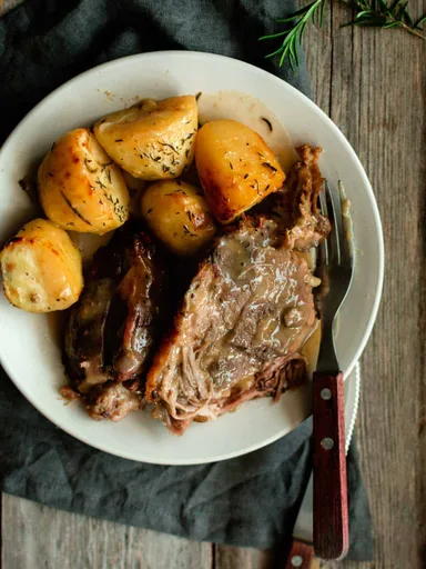 Slow Cooked Leg Of Lamb (with potatoes + gravy)