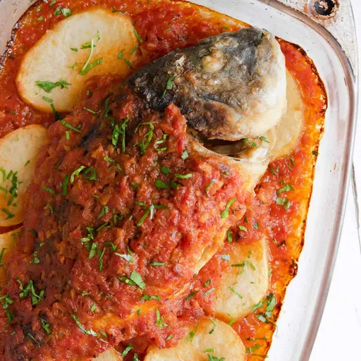 Baked Sea Bream With Tomato Sauce And Potatoes