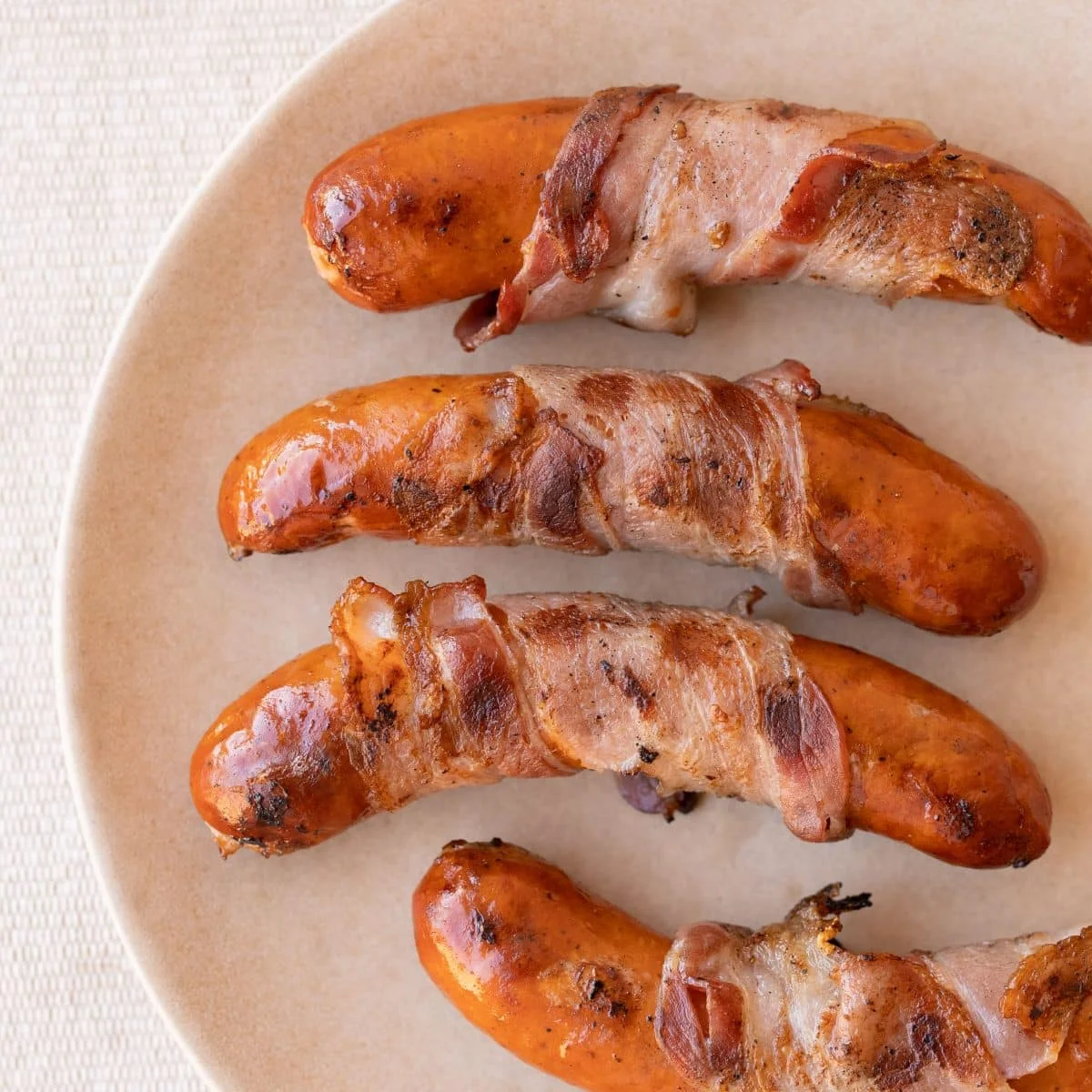 Bacon-wrapped sausages