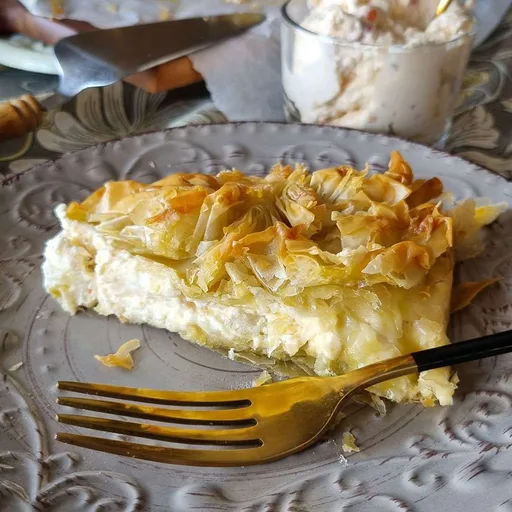 Crumpled filo cheese pie with spicy cheese spread