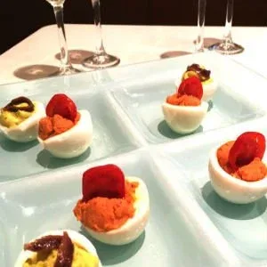 Italian Deviled Eggs with Pesto Genovese and Tomato Sauce