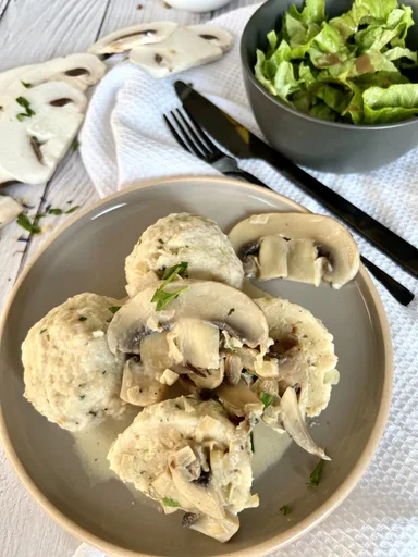 Semmelknödel- German bread Dumplings with a mushroom sauce