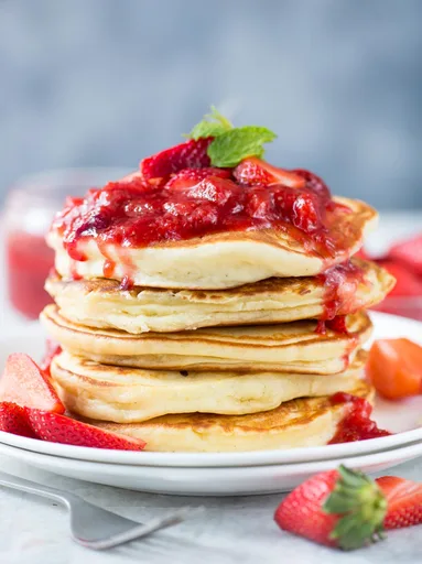 Fluffy Ricotta Pancakes with Strawberry Sauce