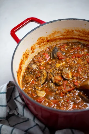 Ragú vegano de lentejas y champiñón
