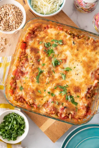 Farro al horno con lentejas, tomate y mozzarella