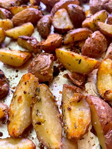 Papas rostizadas al ajillo