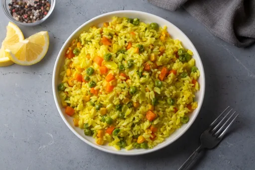 Cómo hacer arroz con zanahoria, maíz y guisantes