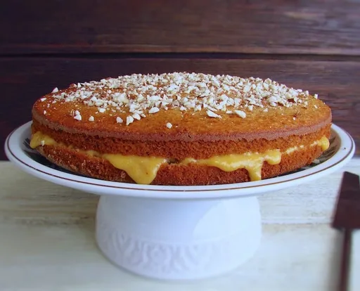 Almond cake filled with sweet egg cream