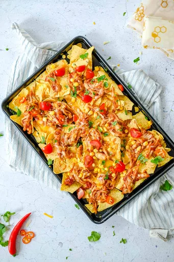 Nachos con pollo desmenuzado
