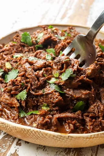 Ternera desmenuzada a la mexicana