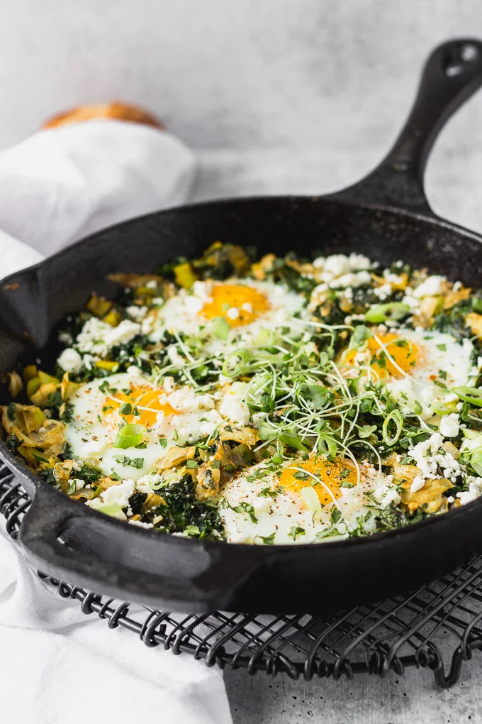 Green Shakshuka with Kale, Leeks, Artichokes, & Feta