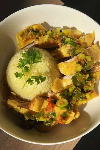 Hainanese Chicken Rice - steamed chicken with ginger & scallion sauce
